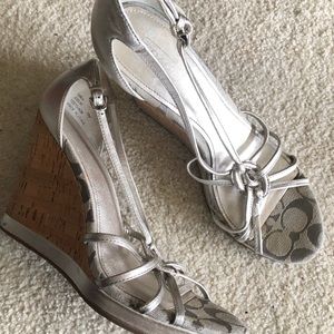 Designer coach with Hill Sandals says 10